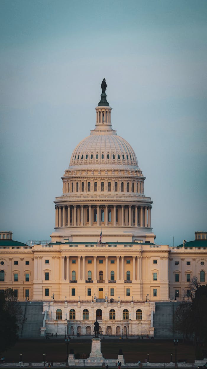 Majestic image of the United States Capitol building in Washington, DC, captured at dusk.